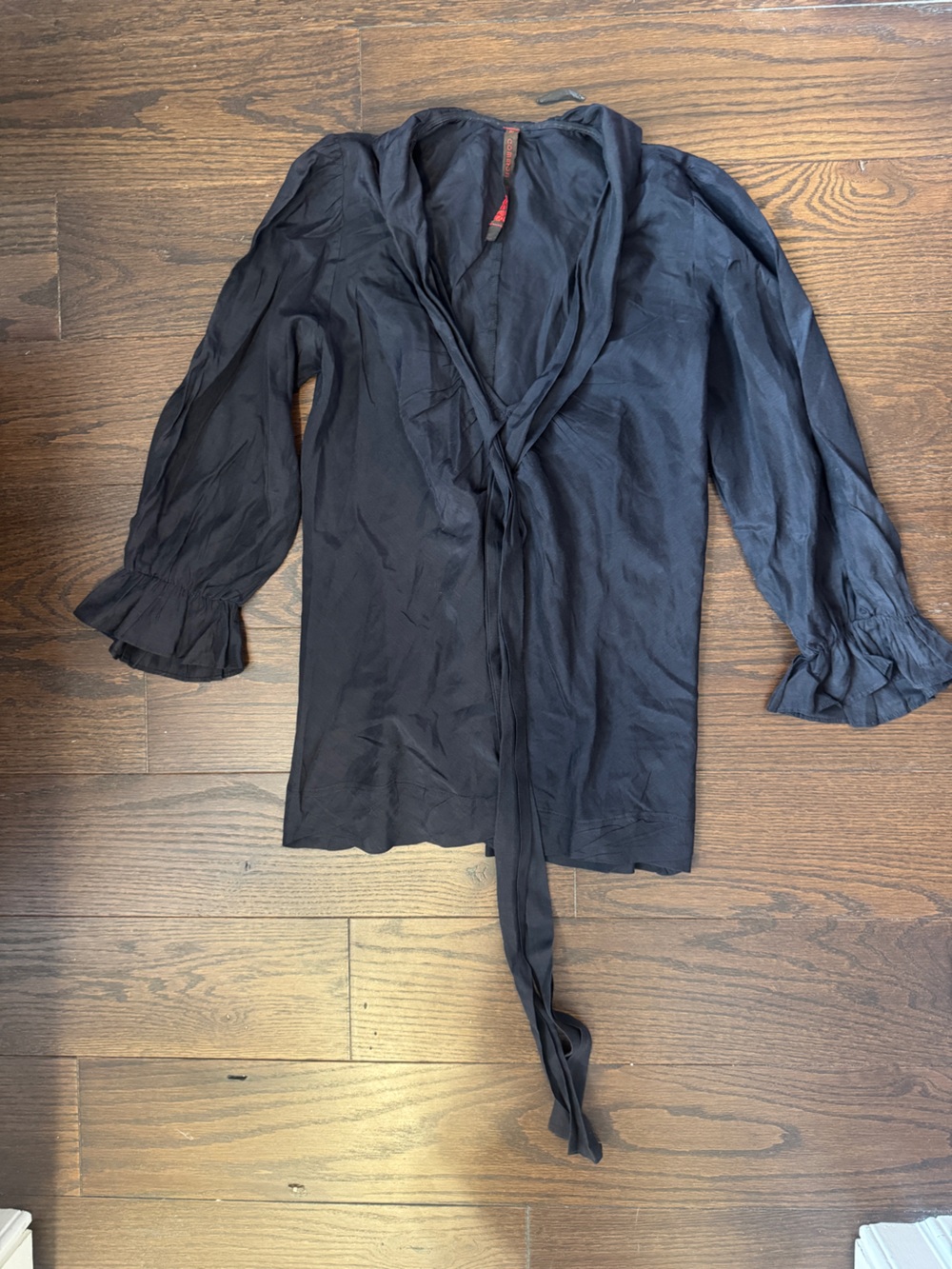 Navy Tie-Neck Ruffle Cuff Blouse